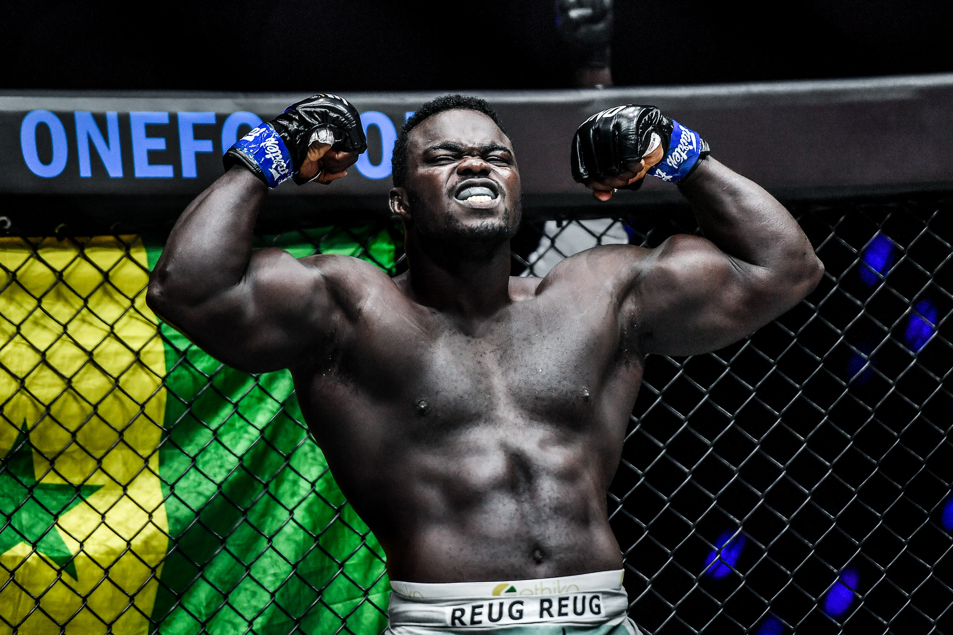 Senegalese MMA star "Reug Reug" Oumar Kane flexes hard before his fight
